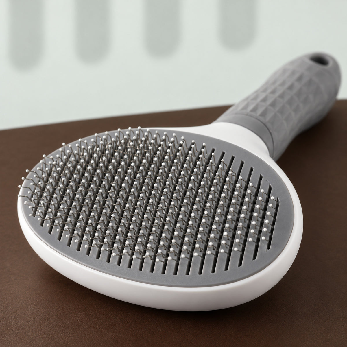 Close-up of the slicker brush's steel pins with rounded tips