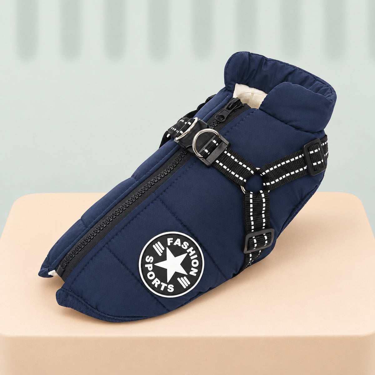 Navy blue dog jacket with built-in harness and reflective straps
